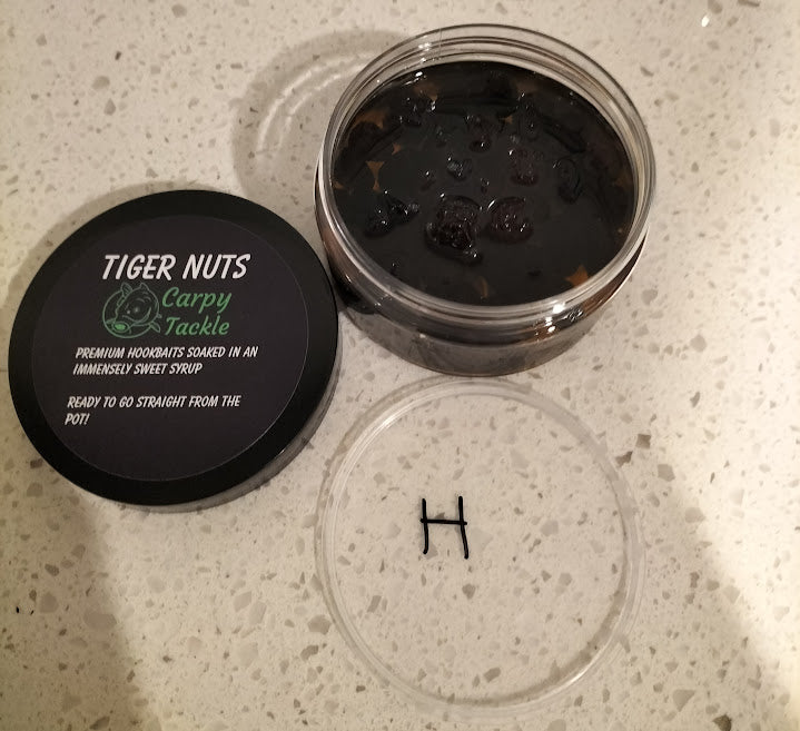Black XXL Tiger Nut Hookbaits Soaked In Various Syrup (100g Pot)